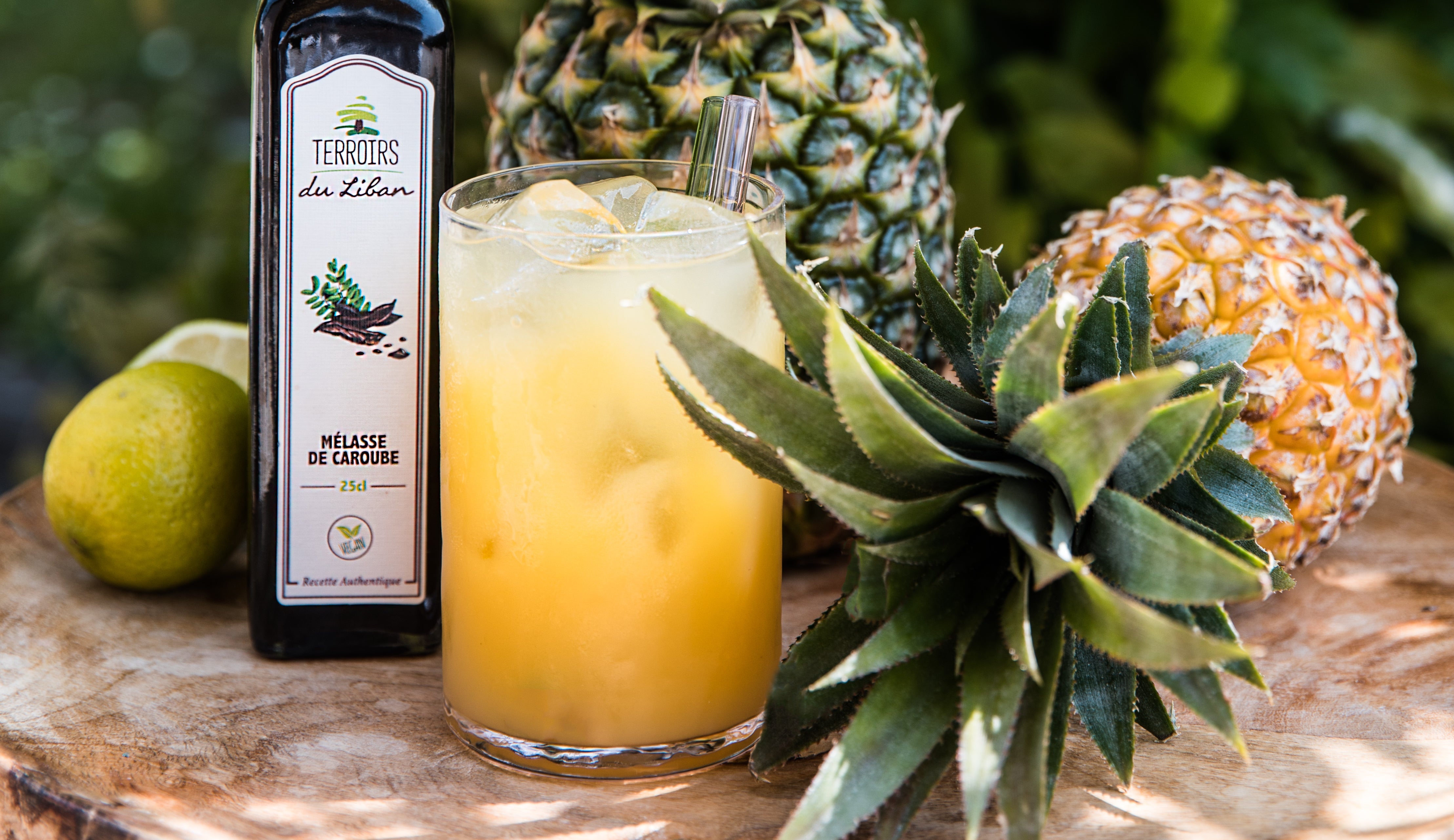 Summer Cocktail with Pineapple and Carob Molasses